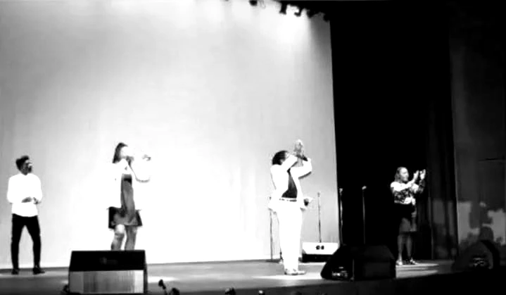 Malik Allsop performs live at Queen's Hall with Amethyst Vocal Band TT for the Esimaje Foundation. (Second Night)